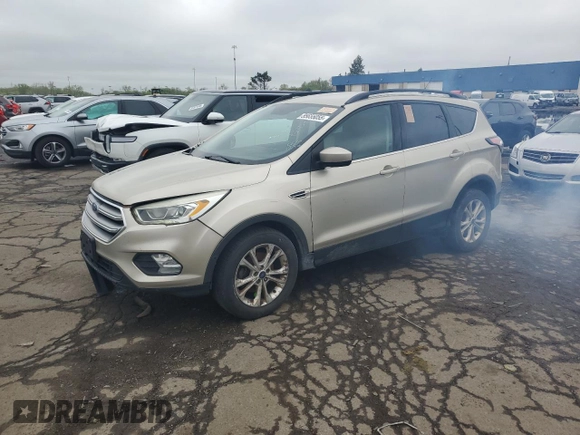 2017 Ford Escape SE z VIN 1FMCU0GDXHUB90657, wystawiony jako Copart lot #55655055 z przebiegiem 229 960 mil mil oraz Czysty tytuł • Clean title. Historia ofert i sprzedaży dostępna na DreamBid. Obrazek 1.