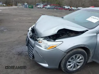 2015 Toyota Camry XLE with VIN 4T4BF1FK1FR468666, listed as a IAAI auction lot 42005934 with 124,173 mi miles and . Bid and sale history available at DreamBid. Image 6.