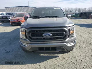 2021 Ford F-150 XL with VIN 1FTEW1EP5MFB61351, listed as a Copart auction lot 47175195 with 64,269 mi miles and Clean Title. Bid and sale history available at carsss.com. Image 5.