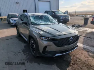 2023 Mazda CX-50 2.5 Turbo with VIN 7MMVABXY0PN152447, listed as a Copart auction lot 50781195 with 28,806 mi miles and Salvage Title. Bid and sale history available at carsss.com. Image 14.