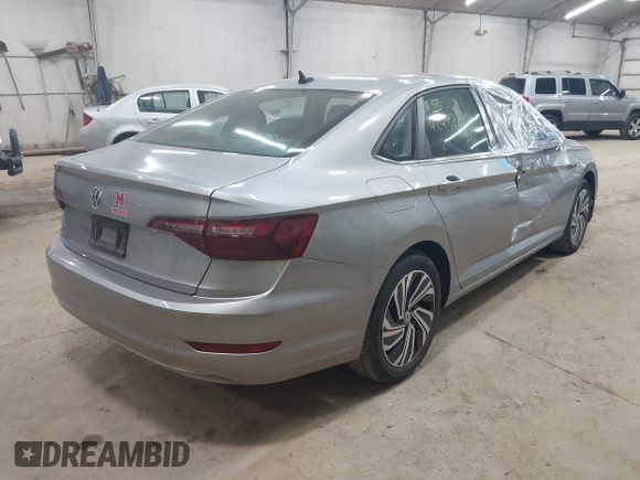 2021 Volkswagen Jetta SEL with VIN 3VWE57BUXMM056379, listed as a IAAI auction lot 42456450 with 34,697 mi miles and . Bid and sale history available at DreamBid. Image 4.