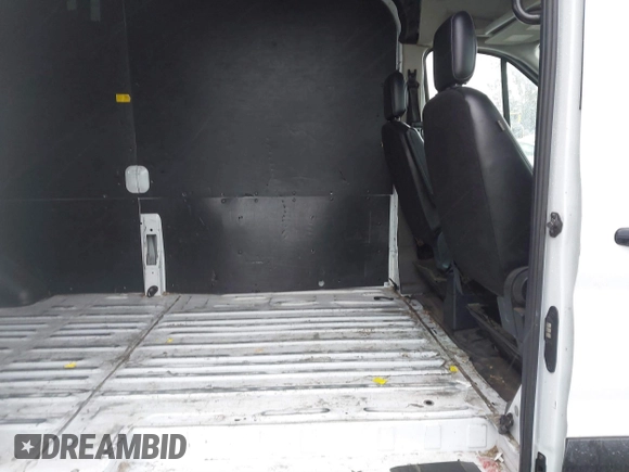 2020 Ford Transit Cargo with VIN 1FTBR1X82LKB60762, listed as a IAAI auction lot 41572948 with 112,050 mi miles and . Bid and sale history available at DreamBid. Image 8.