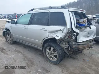 2003 Mitsubishi Outlander LS with VIN JA4LZ31G93U105062, listed as a IAAI auction lot 40978708 with 202,965 mi miles. Bid and sale history available at carsss.com. Image 3.