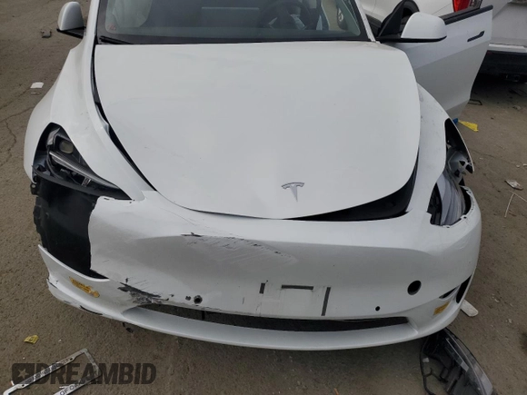 2022 Tesla Model Y Performance with VIN 7SAYGDEF1NF410241, listed as a Copart auction lot 45017155 with 42,652 mi miles and Salvage Title. Bid and sale history available at DreamBid. Image 12.