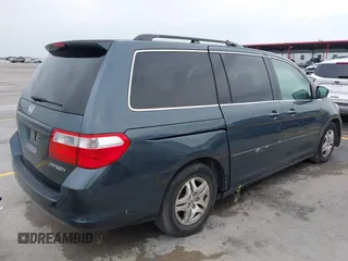 2005 Honda Odyssey EX-L with VIN 5FNRL38775B110232, listed as a IAAI auction lot 42301513 with 277,389 mi miles and . Bid and sale history available at DreamBid. Image 4.