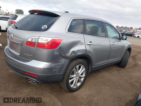 2011 Mazda CX-9 Grand Touring with VIN JM3TB2DV4B0311112, listed as a IAAI auction lot 41459719 with 135,457 mi miles. Bid and sale history available at carsss.com. Image 4.