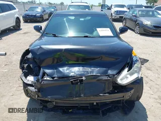 2016 Hyundai Veloster Turbo with VIN KMHTC6AE5GU281597, listed as a IAAI auction lot 42006038 with 77,642 mi miles. Bid and sale history available at carsss.com. Image 6.