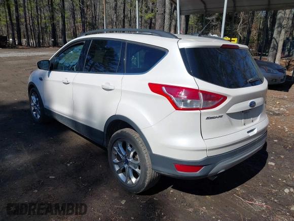 2016 Ford Escape SE with VIN 1FMCU0G9XGUB90670, listed as a IAAI auction lot 41694382 with 167,631 mi miles. Bid and sale history available at carsss.com. Image 3.
