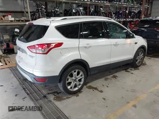 2014 Ford Escape Titanium with VIN 1FMCU9J91EUD43432, listed as a IAAI auction lot 40989177 with 110,383 mi miles and . Bid and sale history available at DreamBid. Image 4.