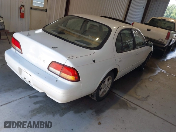 1997 Nissan Maxima GXE z VIN JN1CA21D4VT215672, wystawiony jako IAAI lot #42479487 z przebiegiem 257 178 mil mil oraz . Historia ofert i sprzedaży dostępna na DreamBid. Obrazek 4.