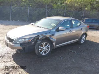 2013 Kia Optima EX with VIN 5XXGN4A71DG158712, listed as a IAAI auction lot 41965166 with 126,943 mi miles. Bid and sale history available at carsss.com. Image 2.