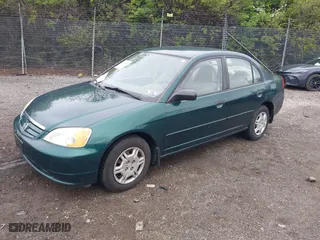 2001 Honda Civic LX with VIN 2HGES16531H556116, listed as a IAAI auction lot 42004307 with 139,074 mi miles. Bid and sale history available at carsss.com. Image 2.