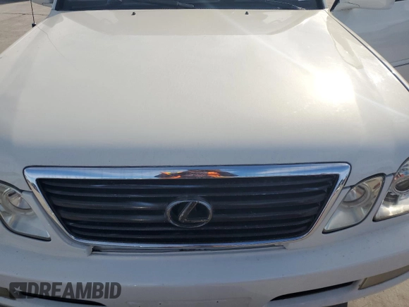 2002 Lexus LX 470 z VIN JTJHT00W623514108, wystawiony jako Copart lot #88704265 z przebiegiem Nie podano mil oraz Tytuł czysty. Historia ofert i sprzedaży dostępna na DreamBid. Obrazek 12.