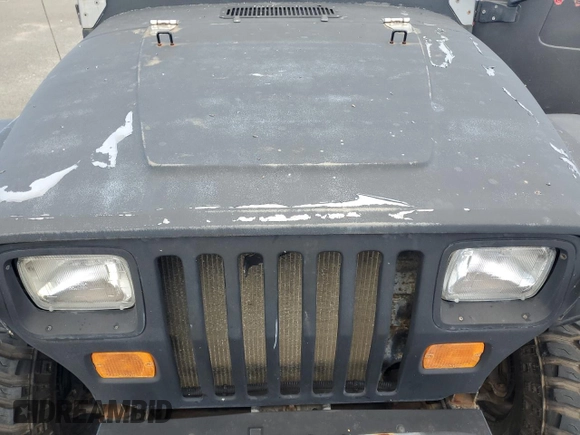 1990 Jeep Wrangler with VIN 2J4FY29T5LJ537896, listed as a Copart auction lot 57021295 with 143,753 mi miles and Clean title. Bid and sale history available at DreamBid. Image 11.
