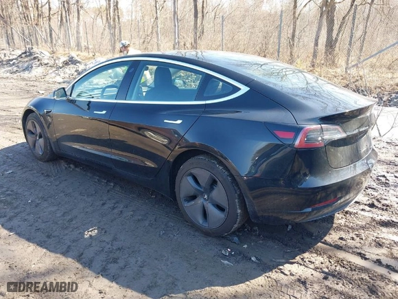 2018 Tesla Model 3 Long Range Battery with VIN 5YJ3E1EB5JF127358, listed as a IAAI auction lot 41759788 with 85,277 mi miles. Bid and sale history available at carsss.com. Image 3.