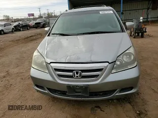 2005 Honda Odyssey EX-L with VIN 5FNRL38715B116530, listed as a Copart auction lot 50807575 with 216,434 mi miles and Salvage Title. Bid and sale history available at DreamBid. Image 12.