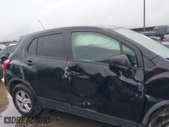 2019 Chevrolet Trax LS with VIN 3GNCJNSB7KL357677, listed as a IAAI auction lot 41897552 with 96,323 mi miles and . Bid and sale history available at DreamBid. Image 17.