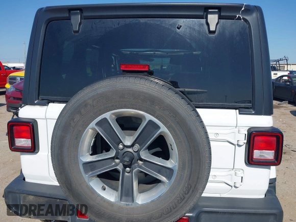 2019 Jeep Wrangler Unlimited Sahara with VIN 1C4HJXEG0KW577917, listed as a IAAI auction lot 41993670 with 90,584 mi miles and . Bid and sale history available at DreamBid. Image 16.