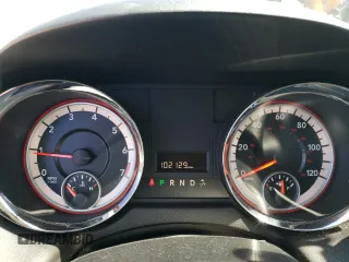 2014 Dodge Grand Caravan American Value with VIN 2C4RDGBG3ER323793, listed as a Copart auction lot 49095945 with 102,129 mi miles and Salvage Title. Bid and sale history available at DreamBid. Image 9.