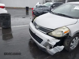 2009 Nissan Versa S with VIN 3N1BC11E39L364397, listed as a IAAI auction lot 41788772 with 223,959 mi miles and . Bid and sale history available at DreamBid. Image 6.