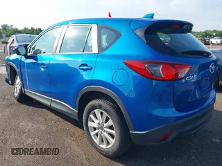 2014 Mazda CX-5 Sport z VIN JM3KE4BE7E0351982, wystawiony jako IAAI lot #42767499 z przebiegiem 154 774 mil mil oraz . Historia ofert i sprzedaży dostępna na DreamBid. Obrazek 3.