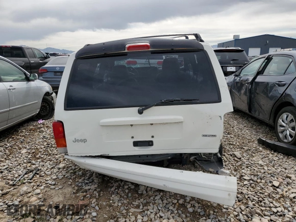2000 Jeep Cherokee Classic с VIN 1J4FF58S7YL133399, выставлен на аукционе Copart как лот 61231845 с пробегом 196 499 миль миль и Списание • Salvage title. История ставок и продаж доступна на DreamBid. Изображение 6.