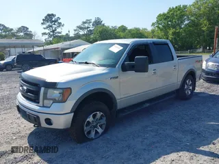 2013 Ford F-150 XL with VIN 1FTFW1ET0DFC85741, listed as a IAAI auction lot 42022221 with 156,509 mi miles. Bid and sale history available at carsss.com. Image 17.