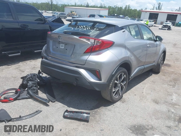 2018 Toyota C-HR XLE with VIN JTNKHMBX7J1009692, listed as a IAAI auction lot 42390685 with 77,866 mi miles and . Bid and sale history available at DreamBid. Image 4.
