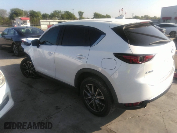 2018 Mazda CX-5 Grand Touring with VIN JM3KFADM4J0309540, listed as a IAAI auction lot 41868480 with 89,110 mi miles. Bid and sale history available at carsss.com. Image 3.