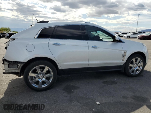 2012 Cadillac SRX Performance Collection with VIN 3GYFNBE33CS540914, listed as a Copart auction lot 54787125 with 130,357 mi miles and Salvage title. Bid and sale history available at DreamBid. Image 3.