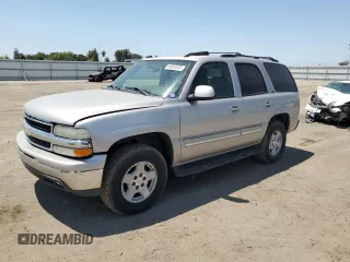 2004 Chevrolet Tahoe LS z VIN 1GNEC13T14R306061, wystawiony jako Copart lot #64892225 z przebiegiem 189 271 mil mil oraz Czysty tytuł • Clean title. Historia ofert i sprzedaży dostępna na DreamBid. Obrazek 1.