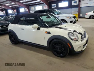 2015 MINI Convertible with VIN WMWZN3C51FT861693, listed as a Copart auction lot 63597565 with 193,157 mi miles and Clean title. Bid and sale history available at DreamBid. Image 4.