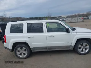 2011 Jeep Patriot Latitude with VIN 1J4NT1GB4BD126488, listed as a IAAI auction lot 41652554 with 179,724 mi miles. Bid and sale history available at carsss.com. Image 13.