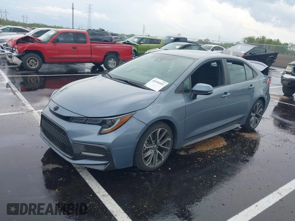2022 Toyota Corolla SE with VIN 5YFS4MCE2NP127633, listed as a IAAI auction lot 41934935 with 34,794 mi miles. Bid and sale history available at carsss.com. Image 2.