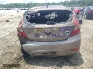 2014 Hyundai Accent SE with VIN KMHCU5AEXEU159810, listed as a Copart auction lot 61634604 with 0 mi miles and Salvage Title. Bid and sale history available at carsss.com. Image 6.