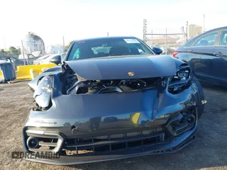 2023 Porsche Panamera S с VIN WP0AB2A70PL130150, выставлен на аукционе IAAI как лот 40179930 с пробегом 5 772 миль миль и . История ставок и продаж доступна на DreamBid. Изображение 6.