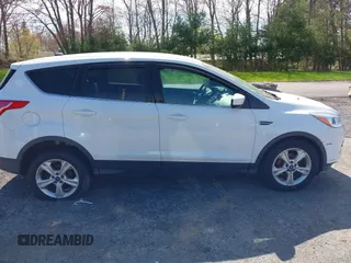 2013 Ford Escape SE with VIN 1FMCU0GXXDUA73875, listed as a IAAI auction lot 42164115 with 195,712 mi miles and . Bid and sale history available at carsss.com. Image 13.