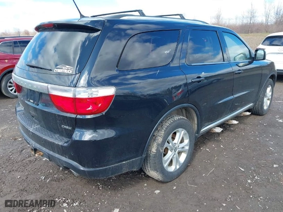 2012 Dodge Durango Crew with VIN 1C4SDJDT8CC112765, listed as a IAAI auction lot 41897695 with 104,271 mi miles. Bid and sale history available at carsss.com. Image 4.