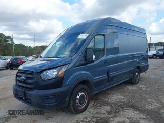 2020 Ford Transit Cargo with VIN 1FTBR3X85LKA55712, listed as a IAAI auction lot 41027144 with 125,658 mi miles. Bid and sale history available at carsss.com. Image 2.
