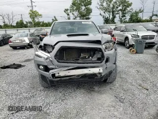2020 Toyota Tacoma SR5 with VIN 3TMAZ5CNXLM121344, listed as a Copart auction lot 59393395 with 69,902 mi miles and Salvage title. Bid and sale history available at DreamBid. Image 14.