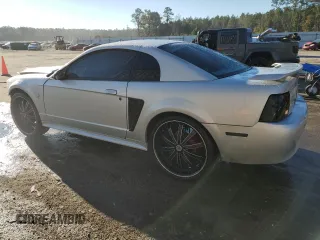 2002 Ford Mustang Standard with VIN 1FAFP404X2F151496, listed as a Copart auction lot 87334454 with Not provided miles and Salvage title. Bid and sale history available at DreamBid. Image 2.