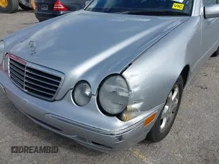 2002 Mercedes-Benz E-Class with VIN WDBJF82J02X070968, listed as a IAAI auction lot 41352216 with 91,704 mi miles. Bid and sale history available at carsss.com. Image 6.