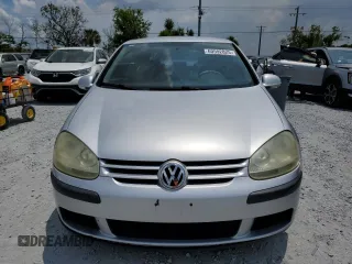 2009 Volkswagen Rabbit S с VIN WVWBA71KX9W048212, выставлен на аукционе Copart как лот 60592825 с пробегом 141 893 миль миль и Списание • Salvage title. История ставок и продаж доступна на DreamBid. Изображение 5.
