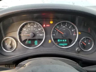 2018 Jeep Wrangler JK Unlimited Sport S with VIN 1C4BJWDG7JL814744, listed as a Copart auction lot 77830714 with 130,229 mi miles and Salvage Title. Bid and sale history available at carsss.com. Image 9.