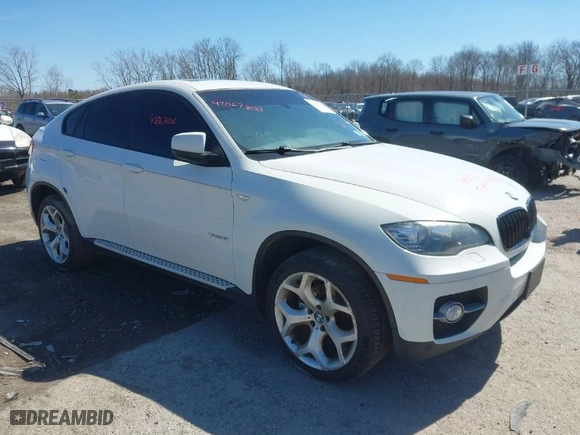 2011 BMW X6 35i with VIN 5UXFG2C58BLX07890, listed as a IAAI auction lot 42067800 with 144,367 mi miles. Bid and sale history available at carsss.com. Image 1.