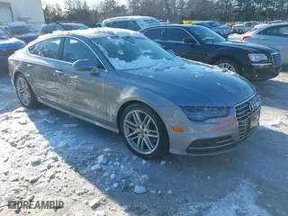 2017 Audi A7 Premium Plus with VIN WAUW2AFC7HN015862, listed as a IAAI auction lot 41613569 with 123,665 mi miles. Bid and sale history available at carsss.com. Image 1.