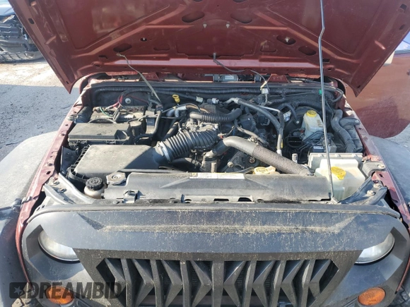 2009 Jeep Wrangler X with VIN 1J4FA24119L756089, listed as a Copart auction lot 56953205 with 158,157 mi miles and Salvage title. Bid and sale history available at DreamBid. Image 11.