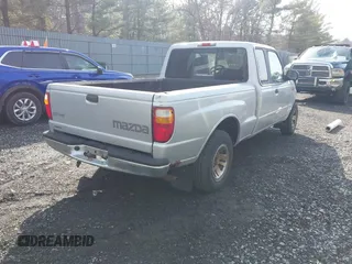2001 Mazda B-Series 2WD Truck DS with VIN 4F4YR16V71TM24316, listed as a IAAI auction lot 41487457 with 226,072 mi miles. Bid and sale history available at carsss.com. Image 4.