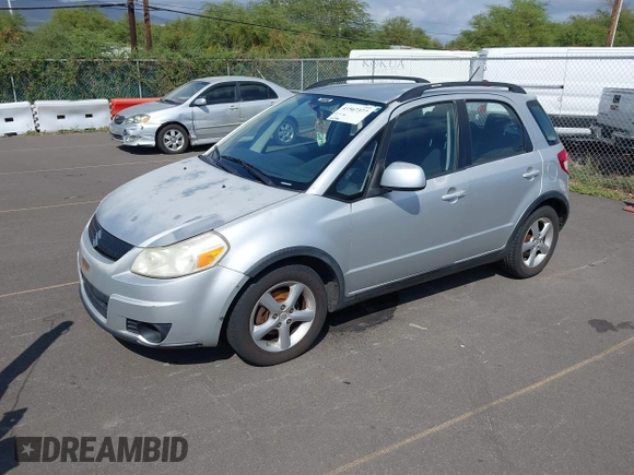 2009 Suzuki SX4 Man FWD with VIN JS2YA413396201567, listed as a IAAI auction lot 41567377 with 110,894 mi miles. Bid and sale history available at carsss.com. Image 2.
