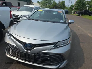 2019 Toyota Camry Hybrid LE z VIN 4T1B31HK1KU511624, wystawiony jako IAAI lot #42501072 z przebiegiem 86 572 mil mil oraz . Historia ofert i sprzedaży dostępna na DreamBid. Obrazek 1.
